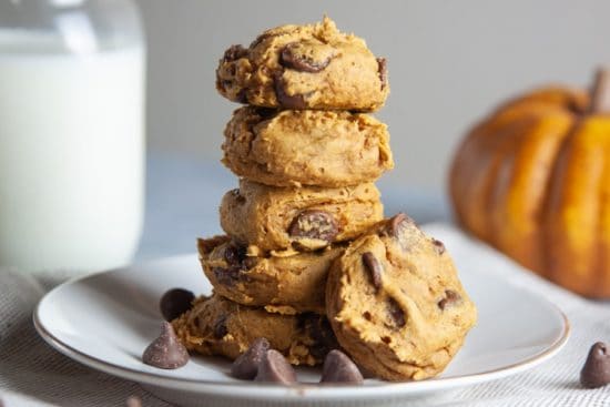 Chocolate chip pumpkin cookies on white plate