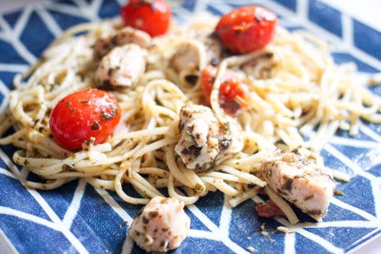 Chicken pesto linguine on blue & white plate