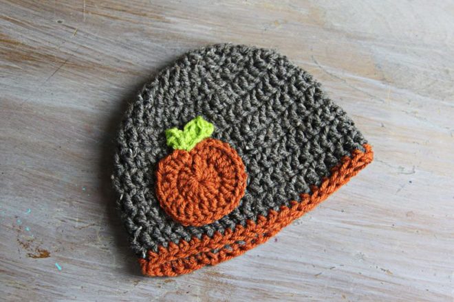 This adorable Crochet Pumpkin Applique is so easy and makes a perfect gift. I have one on a coffee cozy and one on a beanie for the new baby. It would also be cute on a crochet ear warmer headband.