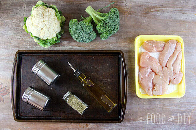 cookie sheet, seasonings, broccoli, cauliflower, raw chicken
