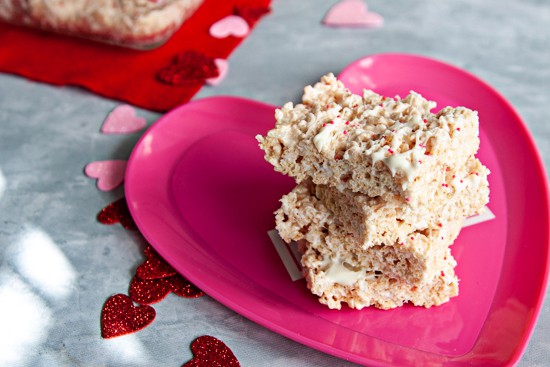 crisp rice cereal treats on a pink heart shaped plate
