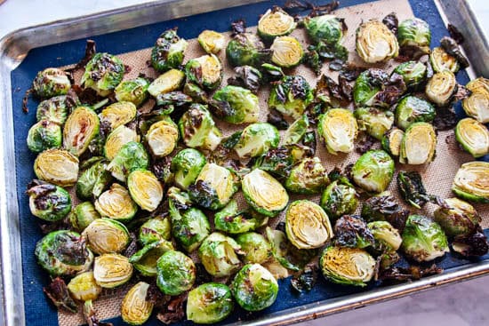 Roasted brussels sprouts on a baking sheet