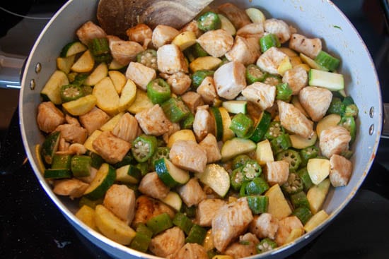 chicken, zucchini, and yellow squash in skillet